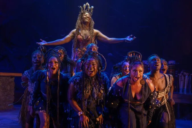 Amber Iman (upper center) and the cast of "Goddess."
