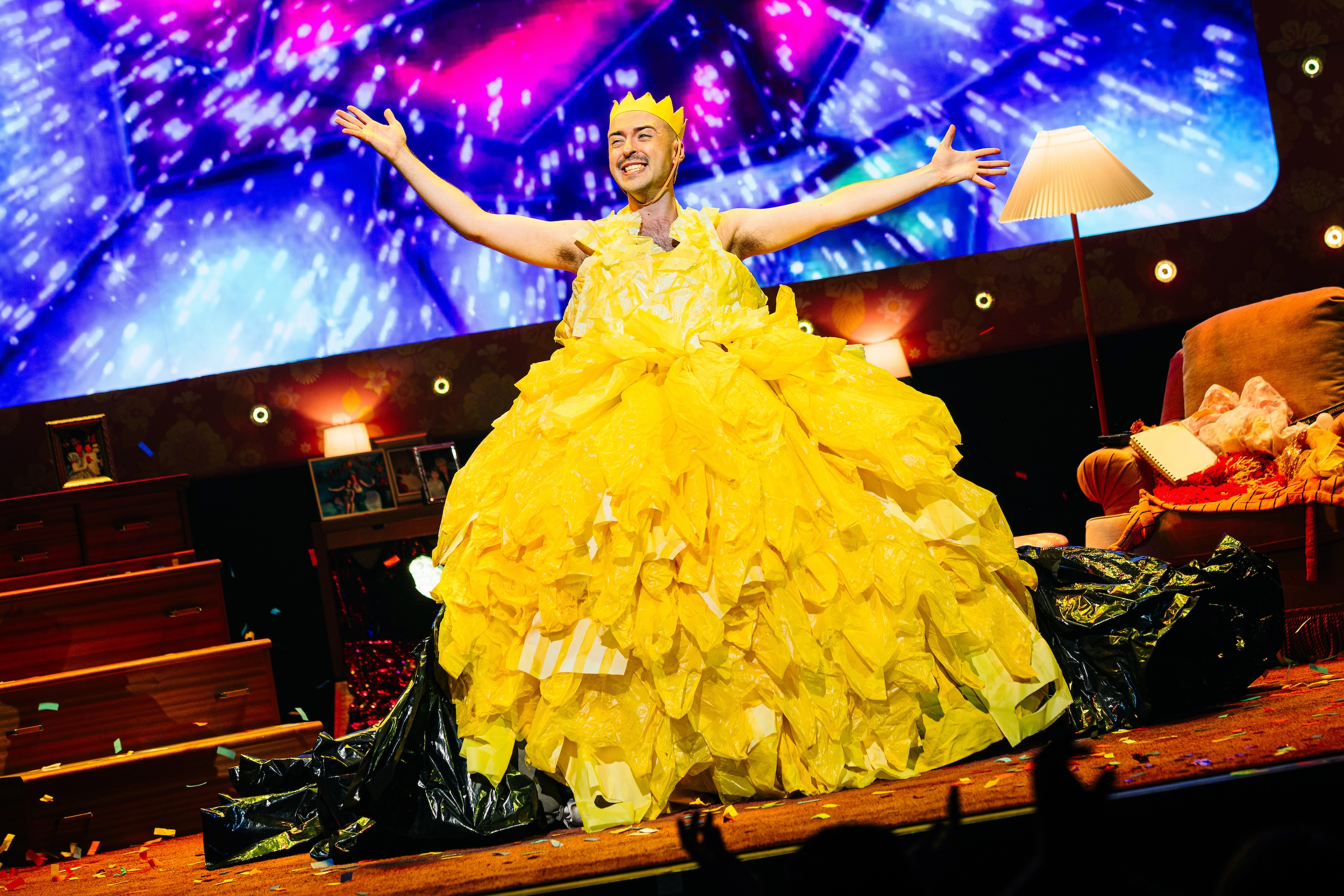 Rob Madge wears a yellow dress in "My Son's a Queer (But What Can You Do?"