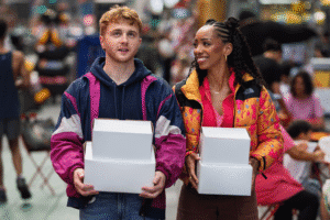 Sam Tutty and Christianni Pitts in "Two Strangers (Carry a Cake Across New York).