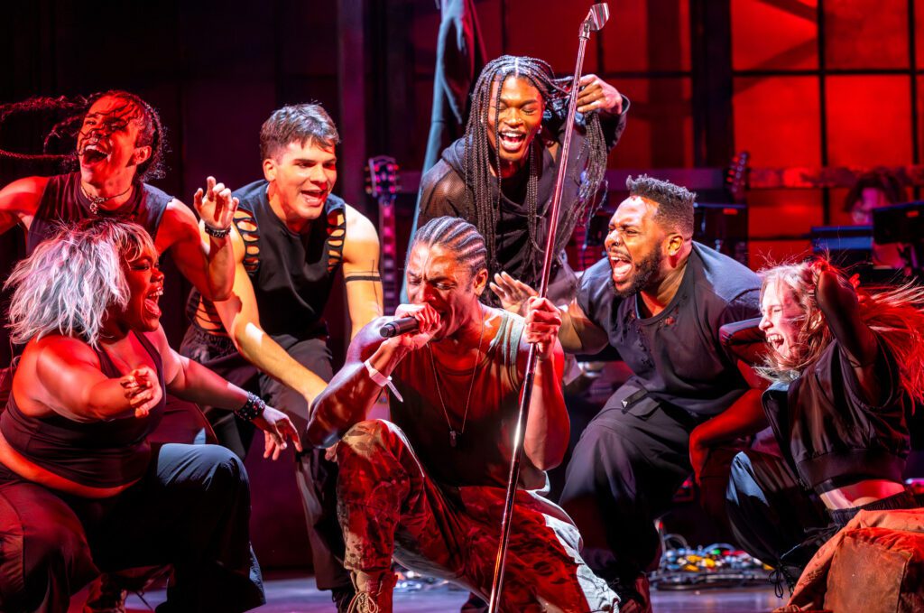 (l-r) Kendal Marie Wilson, AJ Paramo, Christopher Kelley, Aaron James McKenzie, Jarais Musgrove, Eric A. Lewis and Haley Gustafson in "Revolution(s)."