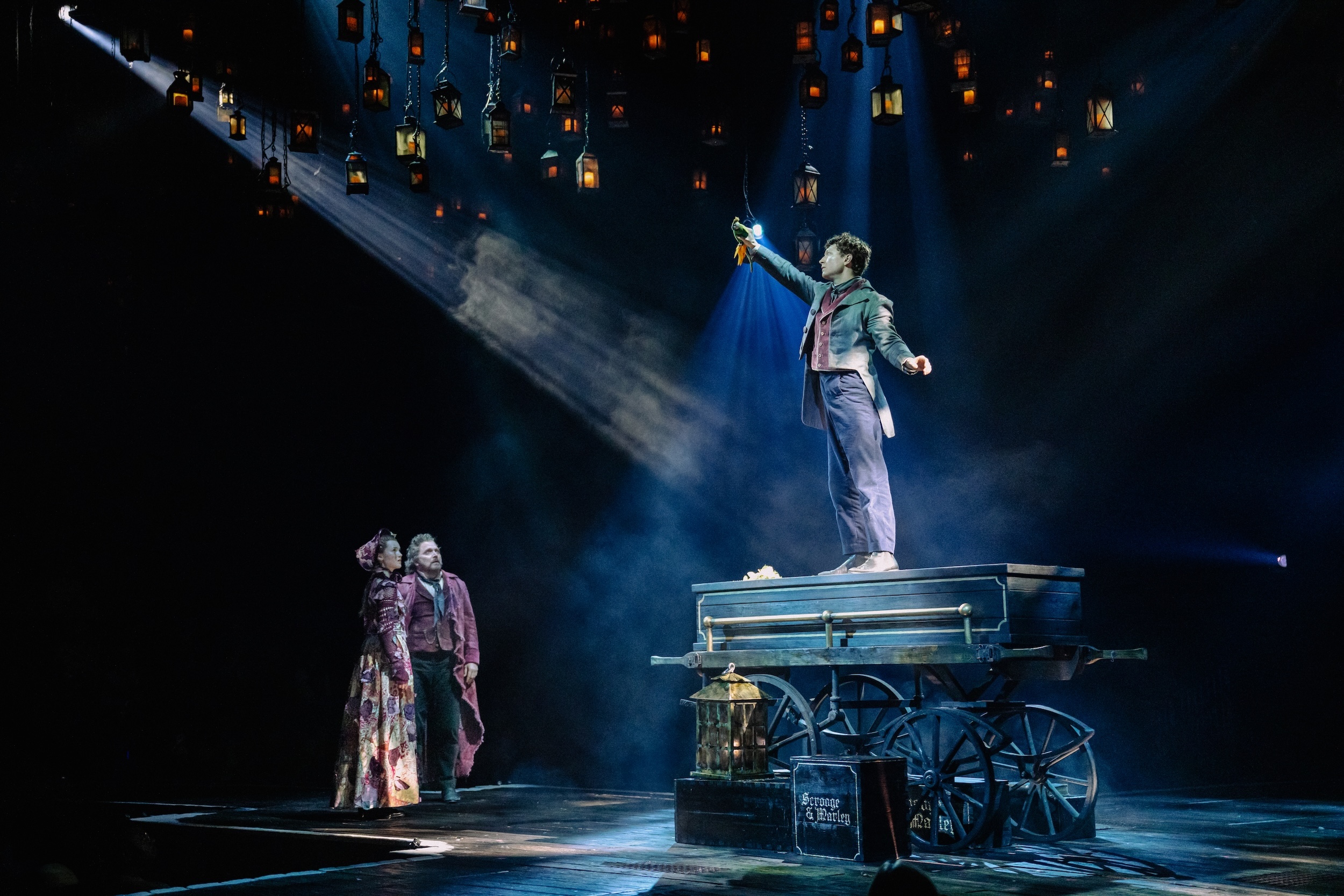 Ashlyn Maddox, Michael Cerveris, and Maxim Chlumecky in "A Christmas Carol" at PAC NYC.