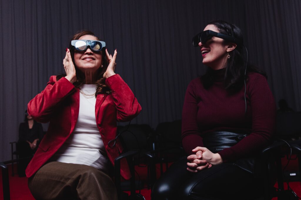Audience members try on headset at the mixed reality production of "An Ark." at The Shed.