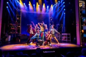 The cast of '11 to Midnight' poses onstage.