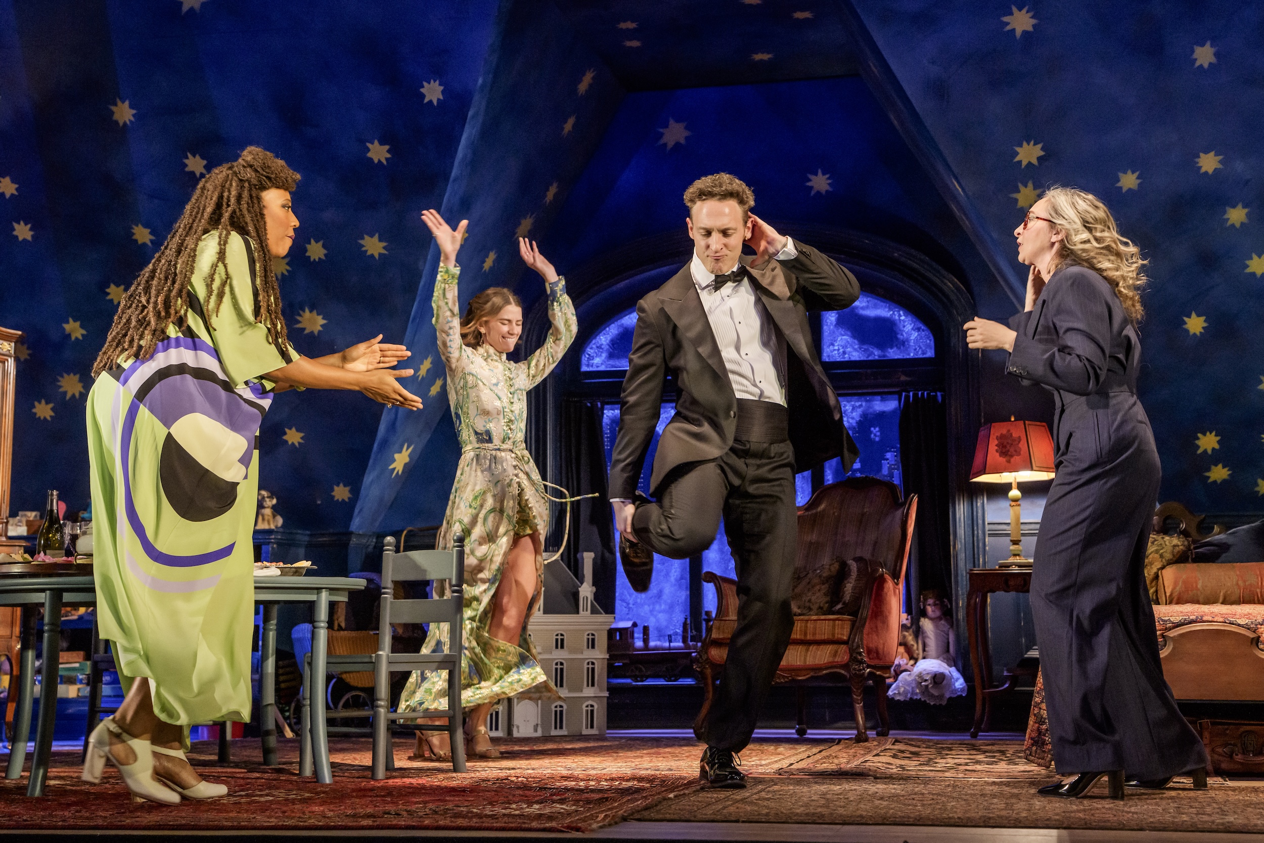 (l-r) ) Christiana Clark, Bryce Gangel, Luigi Sottile, and Jessie Fisher in Goodman Theatre's "Holiday."