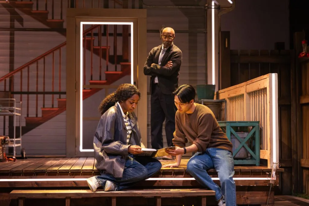 Ayo Edebiti, Don Cheadle, and Jin Ha in "Proof."
