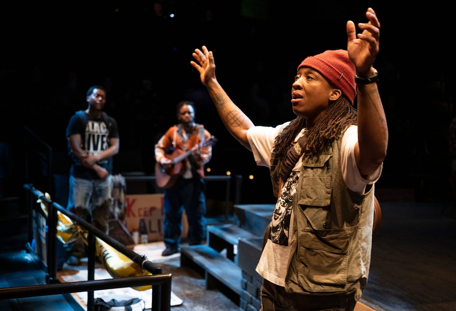 Esco Jouléy (front), Namir Smallwood, and Jon Michael Hill in Steppenwolf Theatre Company’s world premiere of "Windfall."