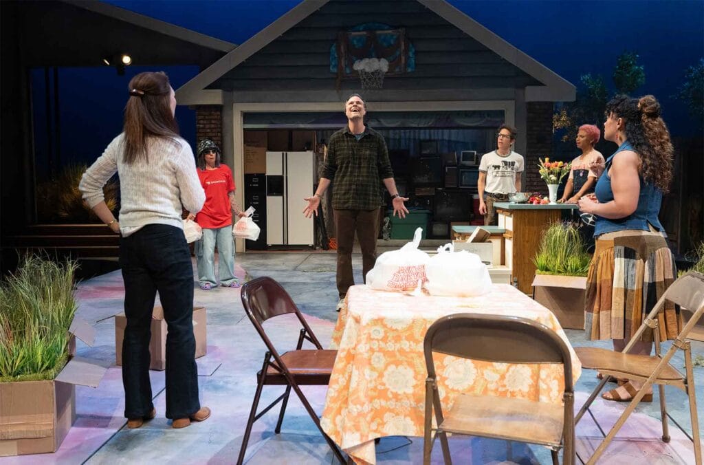 Tim Getman (center) and Ensemble. Photo by Jenny Graham.