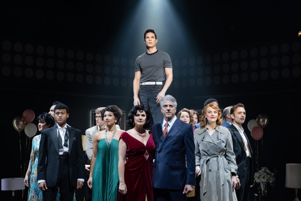 Jason Gotay (center) and the cast of "Merrily We Roll Along"