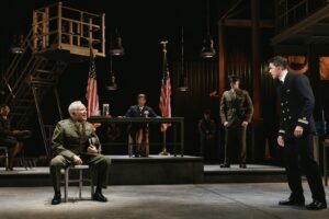 (foreground) Bradley Whitford and Tom Blyth in "A Few Good Men."