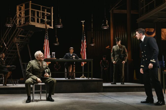 (foreground) Bradley Whitford and Tom Blyth in "A Few Good Men."