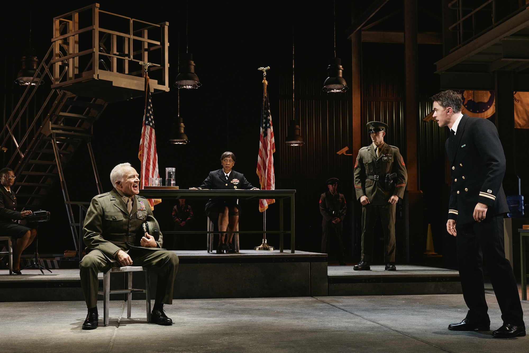 (foreground) Bradley Whitford and Tom Blyth in "A Few Good Men."